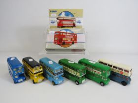 2 Boxed Corgi vehicles Bus and Tram plus 6 unboxed corgi buses.