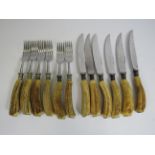 Set 6 of Antler handle knives and forks.