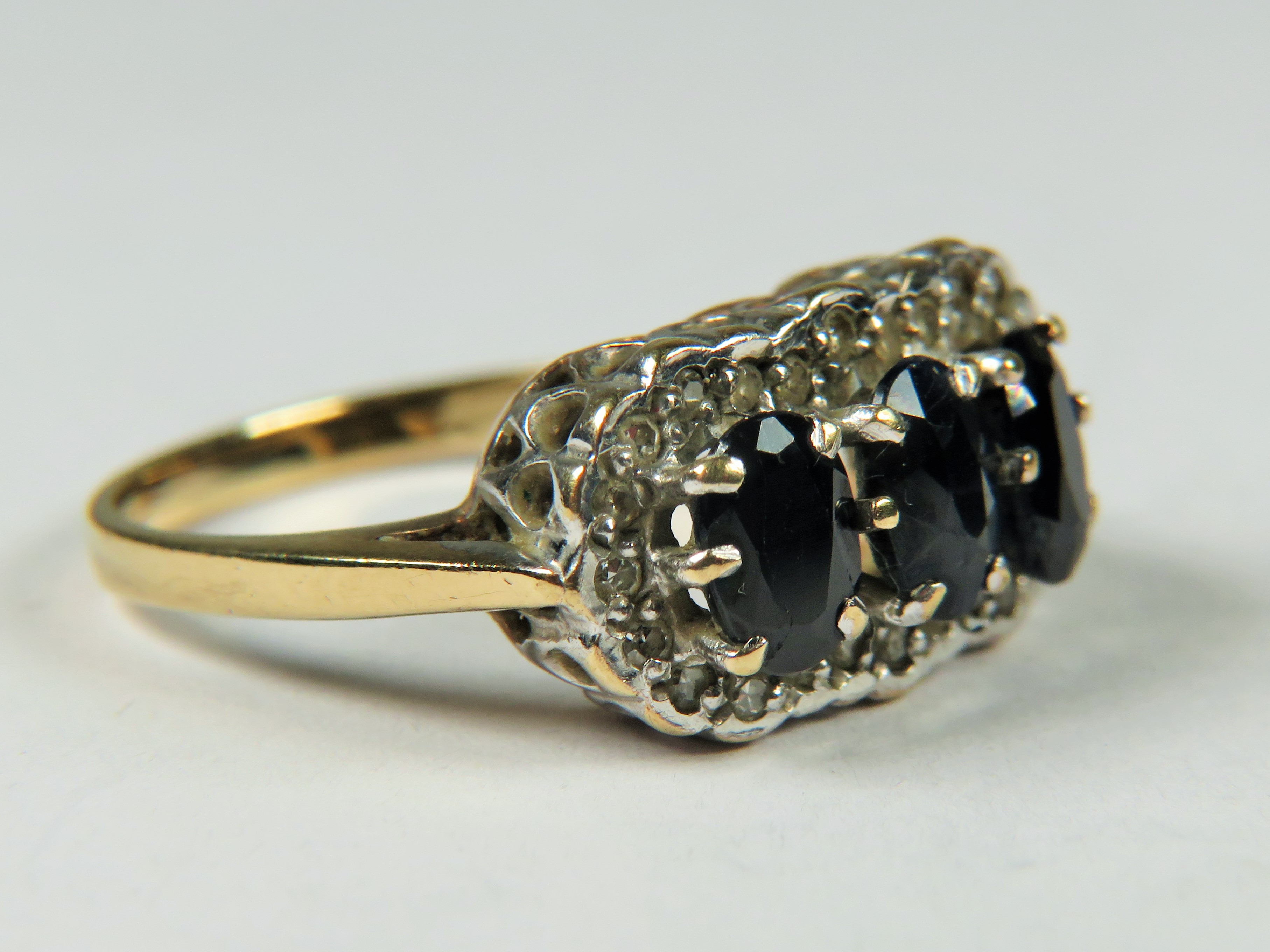 9ct Gold ring set with Triple Sapphires with Diamond surround.   Finger size 'L-5'  3.2g - Image 4 of 5
