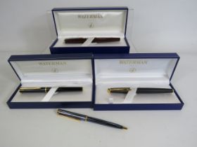 3 Boxed Waterman fountain pens and a empty pen body.