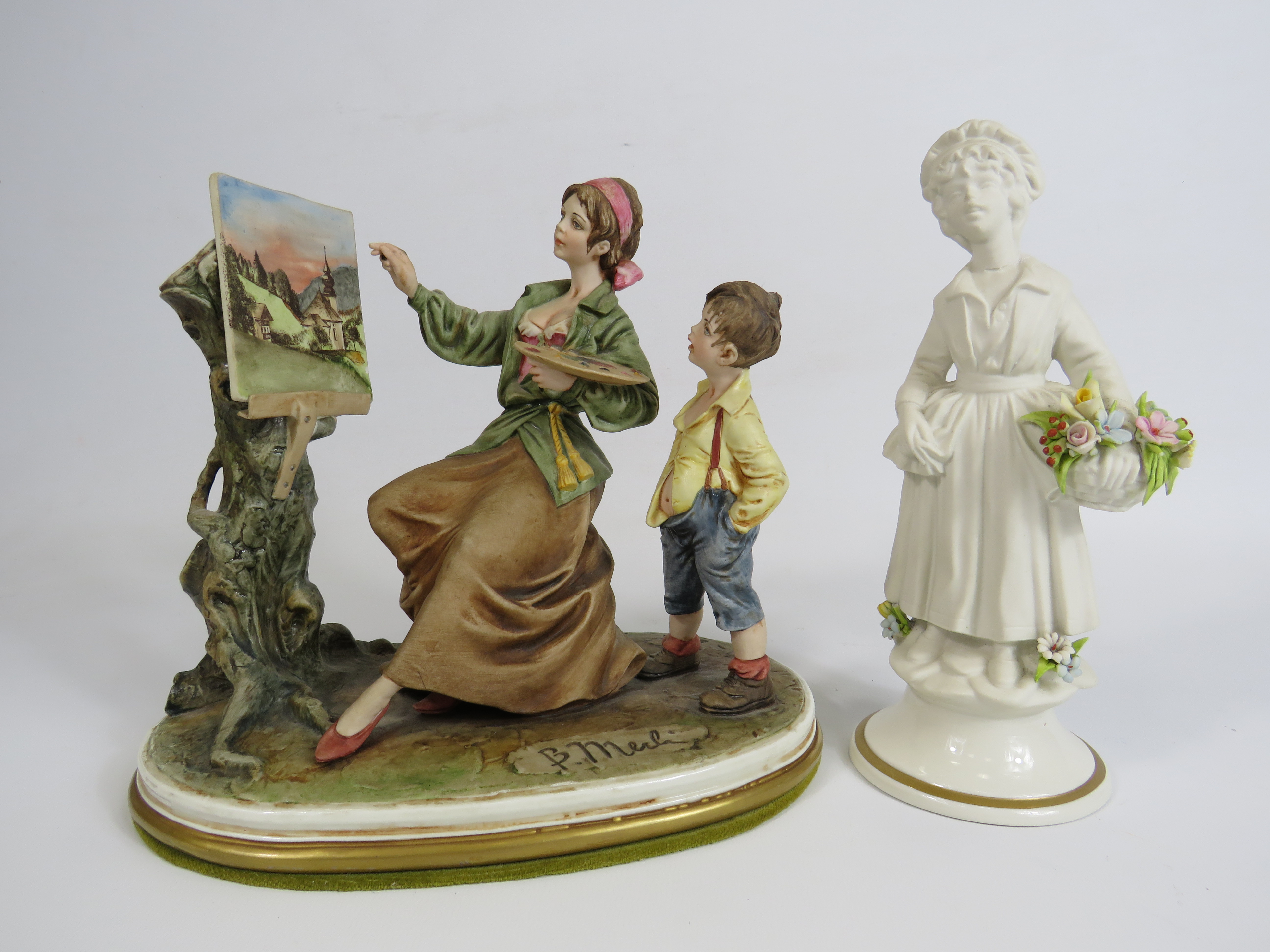 Capodimonte B Merli artist and boy figurine, missing end of paint brush, plus one other figurine