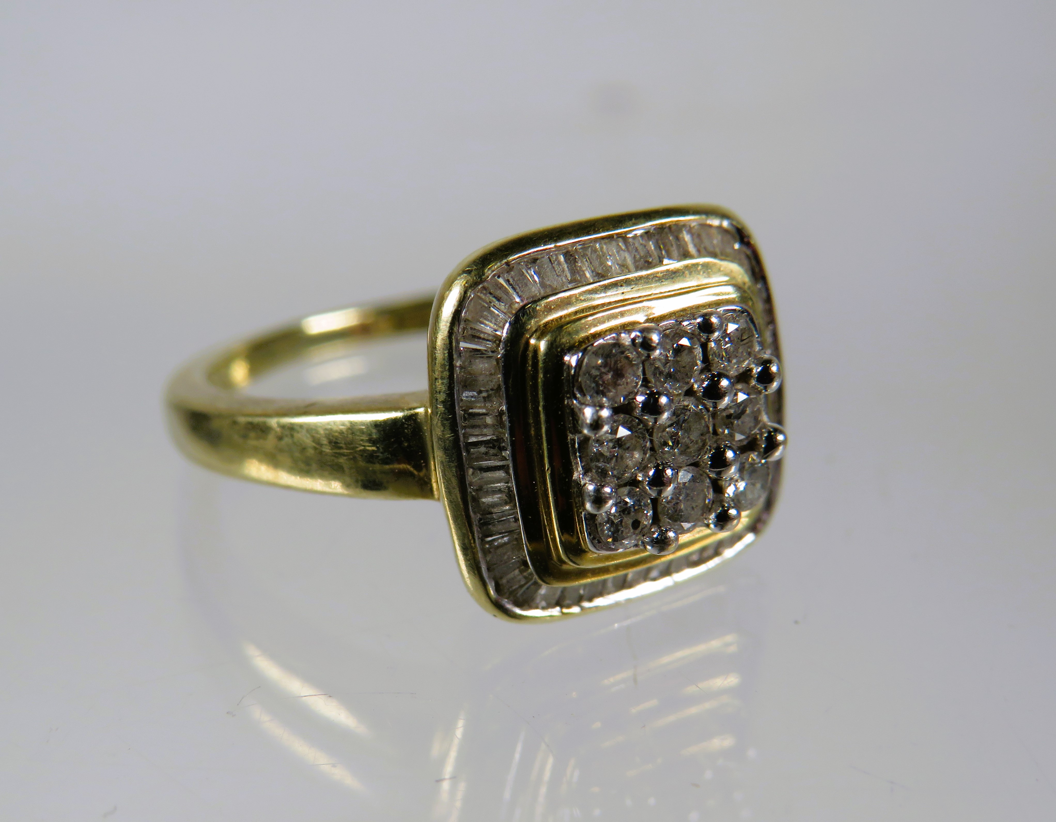 9ct Yellow Gold Ring set in an Art Deco style and set with nine circular Diamonds with Diamond Surro - Image 3 of 3