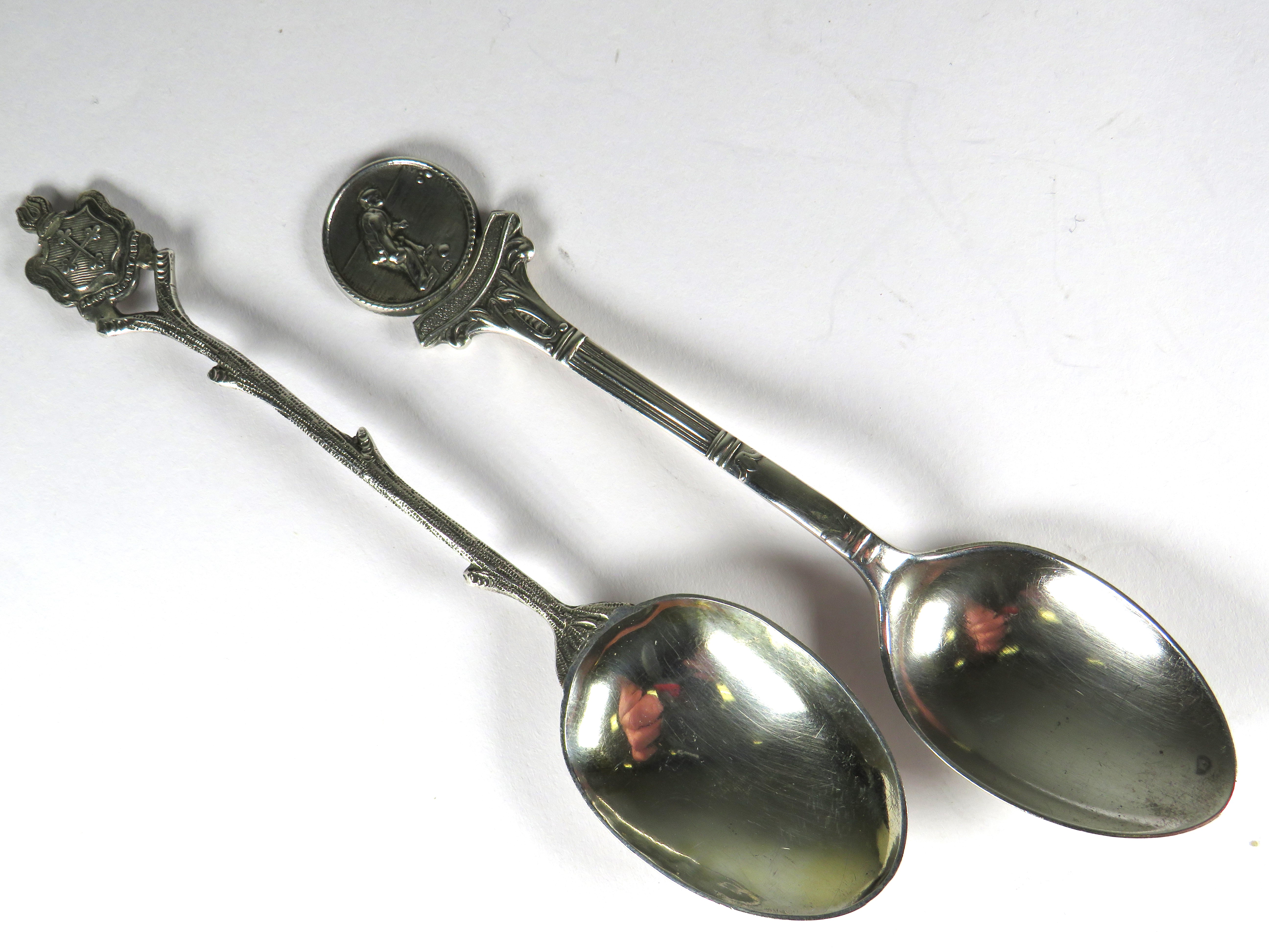 Two Interesting collectable Silver teaspoons.   Total weight 21.9g.  See photos. 