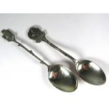 Two Interesting collectable Silver teaspoons.   Total weight 21.9g.  See photos. 