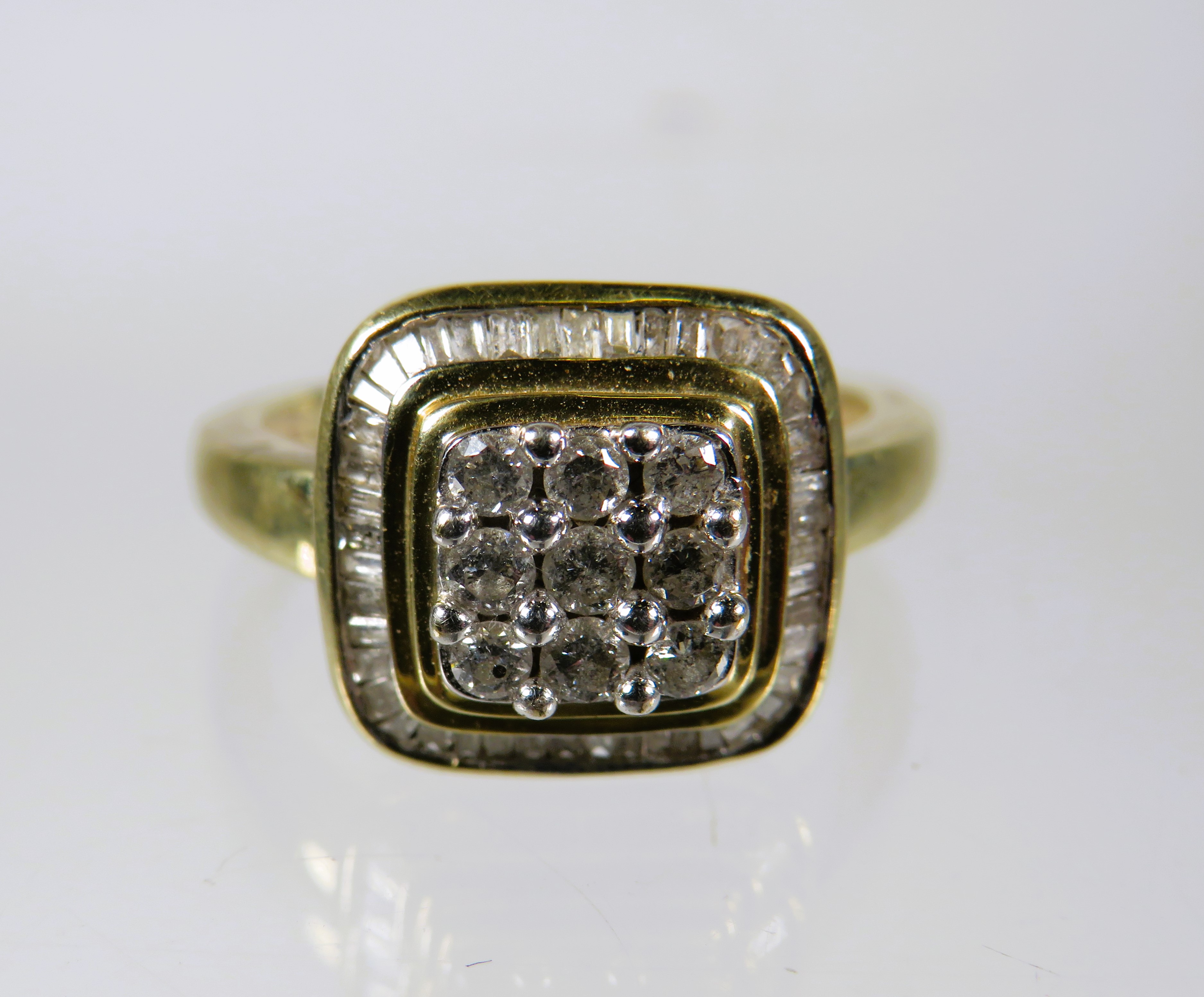 9ct Yellow Gold Ring set in an Art Deco style and set with nine circular Diamonds with Diamond Surro - Image 2 of 3