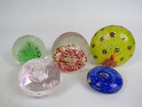 5 Art glass paperweights, Caithness etc.