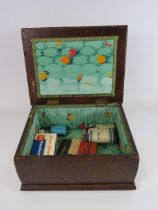 Vintage storage box and contents of vintage first aid items, 31.5cm long 25cm wide 14.5cm tall