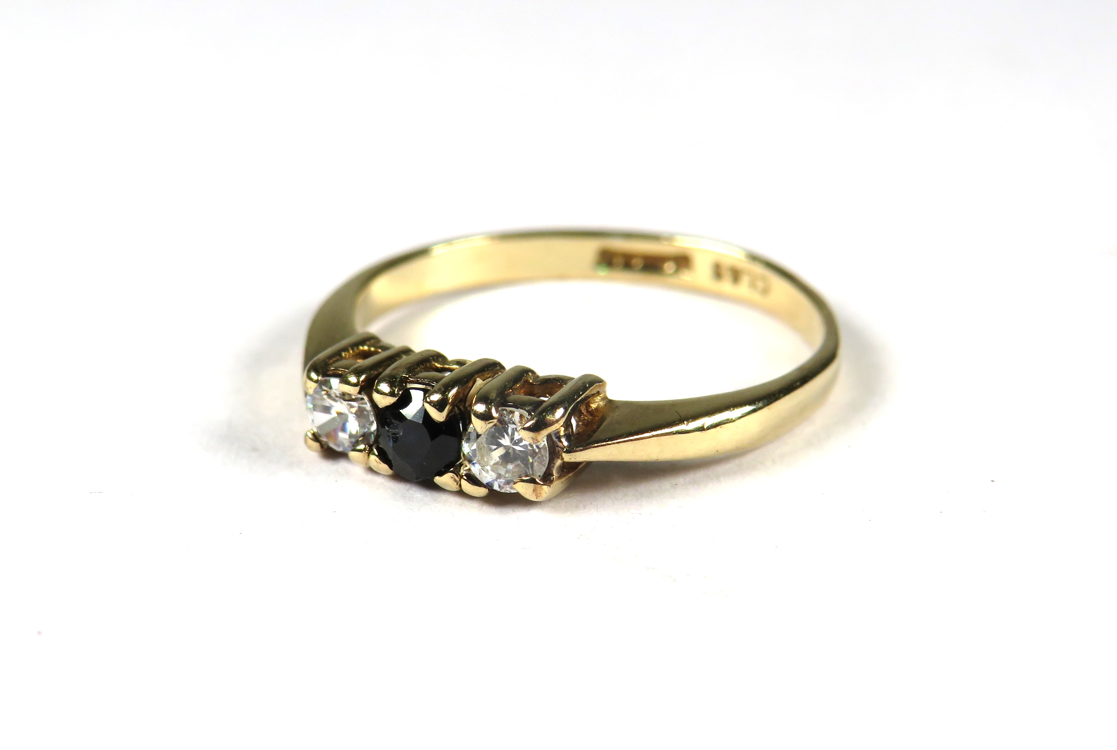 9ct Yellow Gold ring set with a small Central Sapphire Flanked by CZ.  Finger size 'K'    1.3g - Image 3 of 3