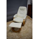 Faux Leather and bentwood manual reclining easy chair with footstool.  See photo.  S2