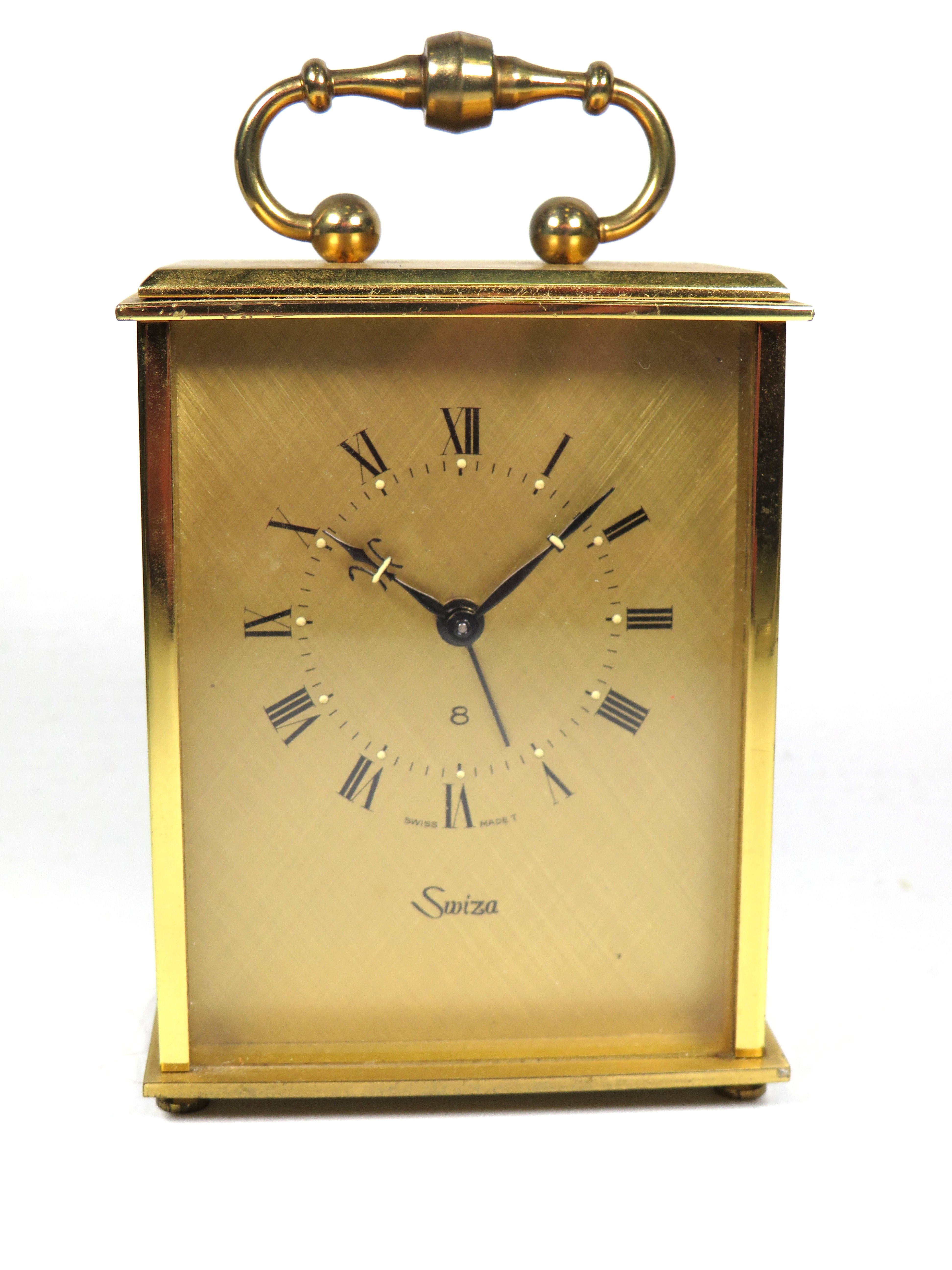 Swiss made Swiza mechanical Carriage clock alarm. Brushed brass case. Running order approx 4 inches 