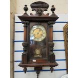 Vintage  wal lclock with Metal and enamel face. Running order with Key. See photos. 