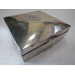 Hallmarked Silver Cigarette box with cedar wood interior. Engraved initials to hinged lid.  Measures