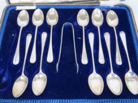 Near full set of Hallmarked Silver spoons in silk and velvet lined box. Total Silver weight 200g.