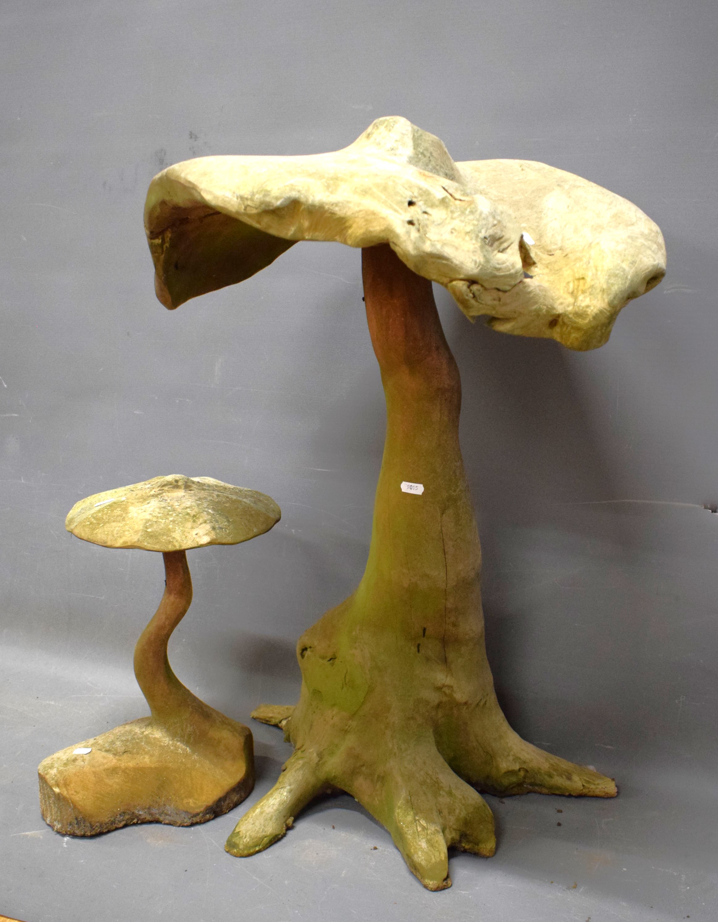 Garden Art as two pieces of Driftwood in the form of Mushrooms.  Both in good order.  Tallest approx