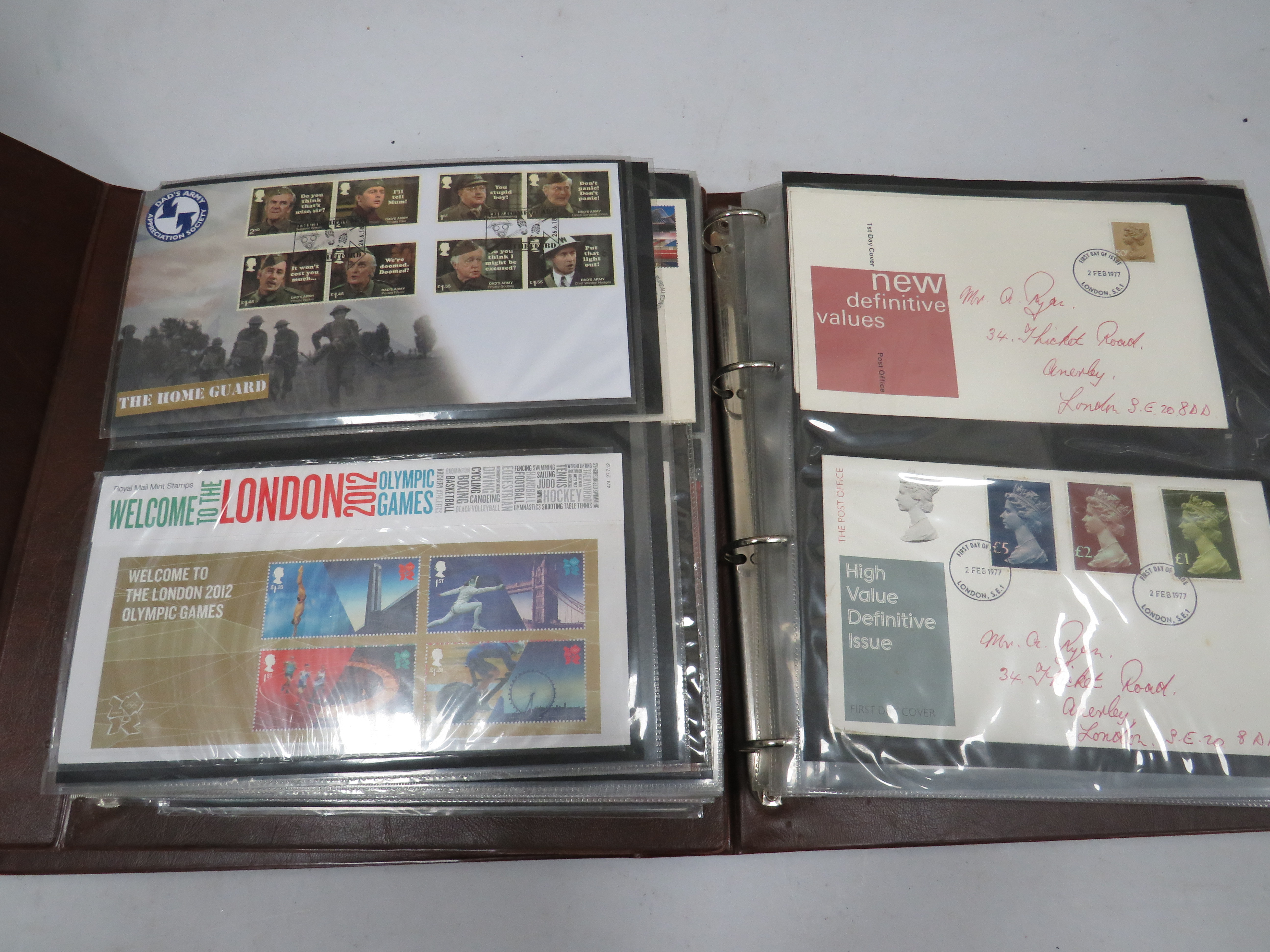 Full and well presented Album of Mint UK Presention packs, FDC's   some coin FDC's see photos. 