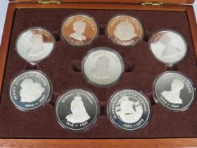 Full Set of Nine 925 Silver Coins (Queens of the British Isles) in Mahogany Case. Each Medal 44.6g