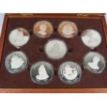 Full Set of Nine 925 Silver Coins (Queens of the British Isles) in Mahogany Case.   Each Medal 44.6g