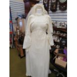 Wedding dress by Berketex UK size 14 with Veil. See photos. 
