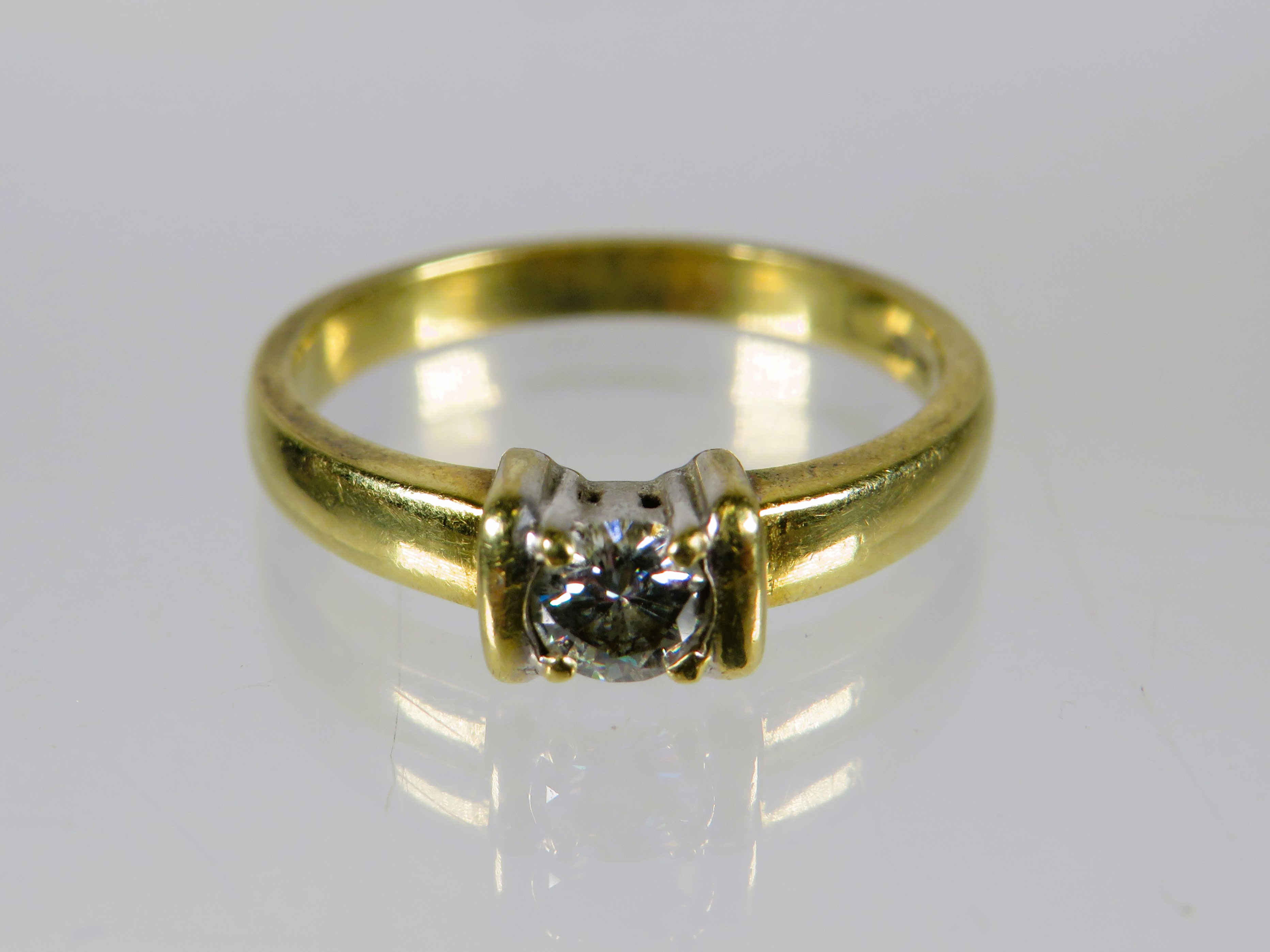18ct Yellow Gold Diamond Solitaire Ring. Diamond measures approx 3.5mm .  Finger size L-5 to M     3