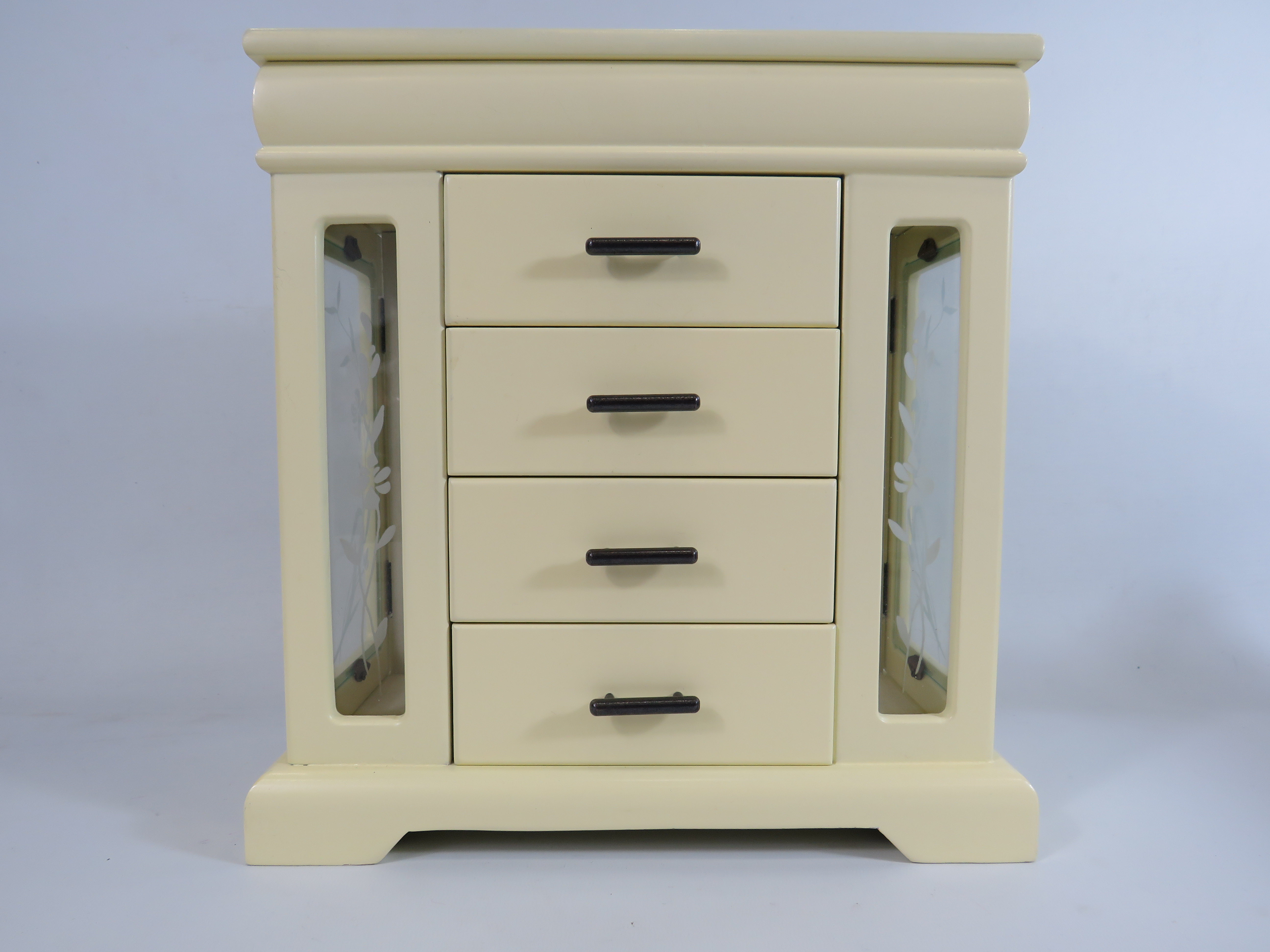 Cream coloured Jewellery cabinet with draws and doors. 12" tall, 11" wide and 5.5" deep