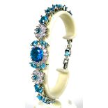 925 Silver Tennis Bracelet, 8 inches with detachable extension. Set with Synthetic Opal & Topaz.   a