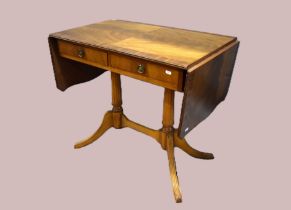 Reproduction pembroke table on twin pedestal legs. H:29 x W:57 (extended) x D:20 inches. Approx.
