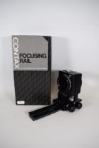 Boxed contax Focusing Rail plus one other Bellows type focusing rail.   See photos. 