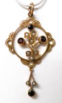 Art Nouveau 9ct Yellow Gold Pendant set with Garnets and Seed pearls. Approx 50mm long. 3.0g