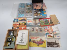 Good mixed lot to include Stamps, FDC's Phone cards together with a boxed Microscope. See photos.