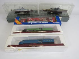 2 Model trains , Corgi superhauler and Two Atlas edition model ships.