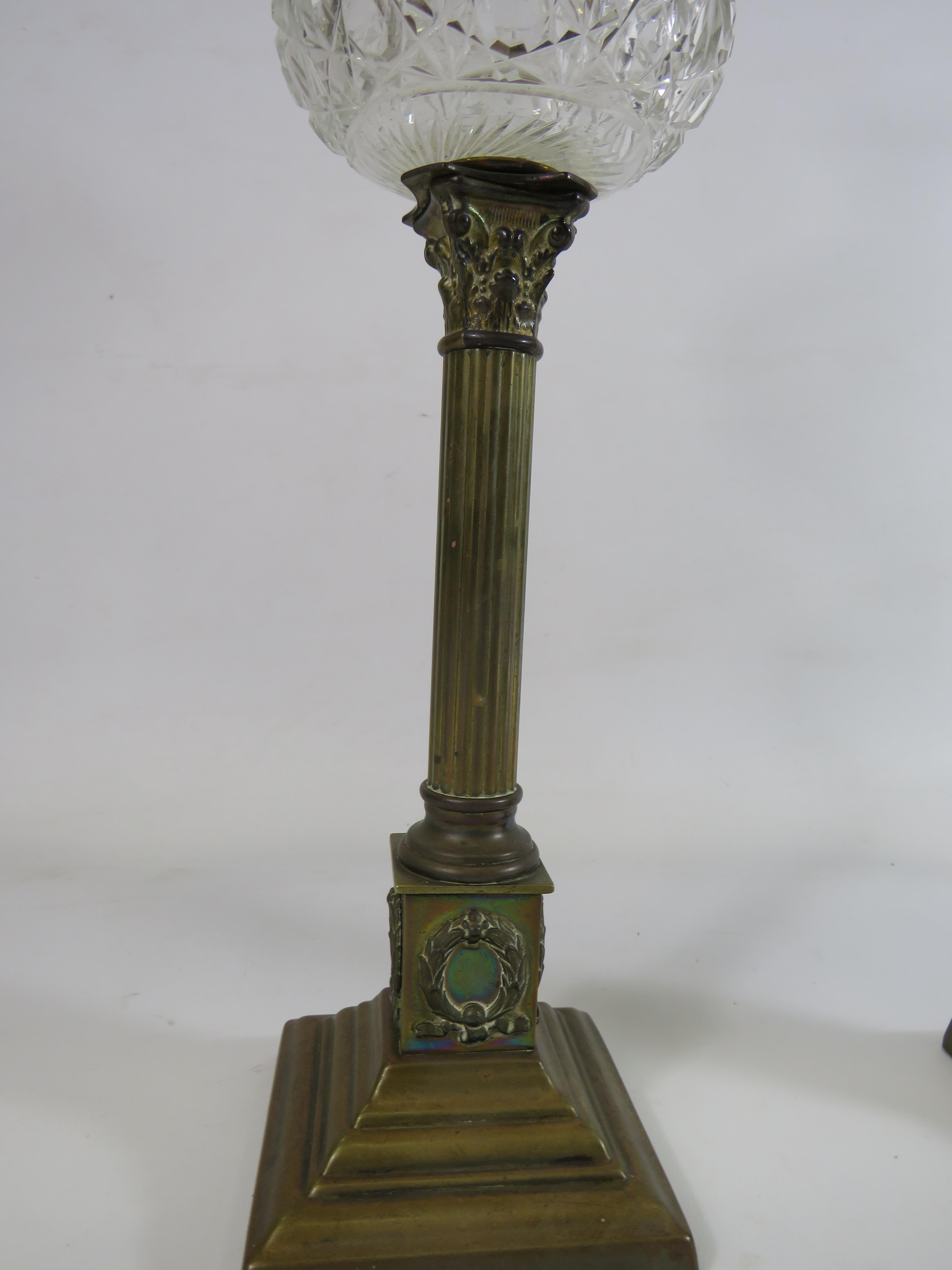 Two vintage brass oil lamps with column bases and crystal glass reserve, approx 21" tall. - Image 2 of 4
