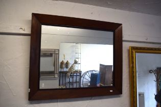 Vintage Mirror with dark wood surround.. Measures approx 27 x 33 Inches. See photos. S2