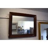 Vintage Mirror with dark wood surround.. Measures approx 27 x 33 Inches. See photos.  S2