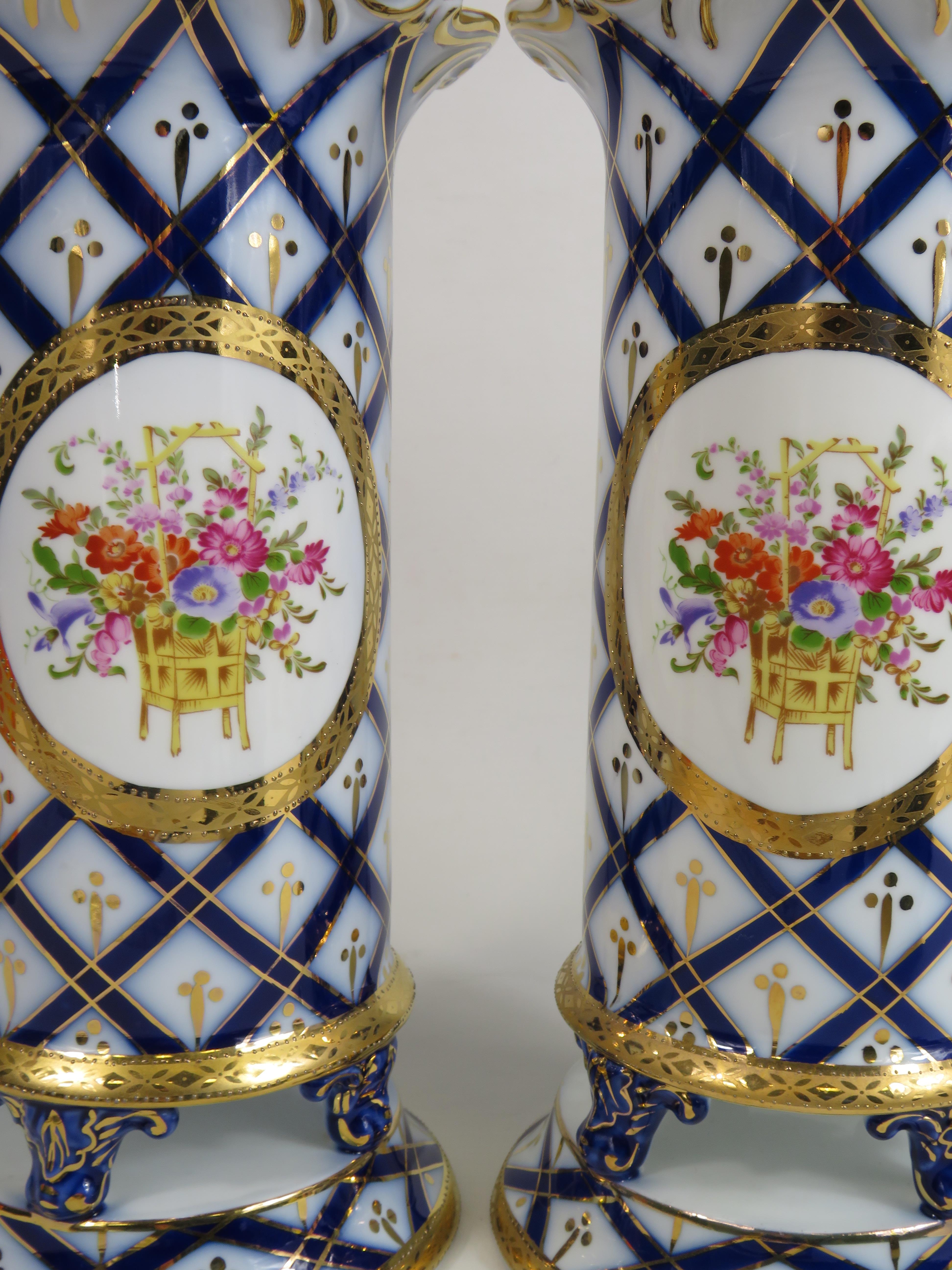 Pair of Roselle Occ & Co Staffordshire vases with hand decorated flowers, approx 29cm tall. - Image 2 of 3