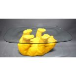 Novelty Coffee table with upside down bear as support. . Glass top.  See photos. 