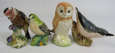 4 Beswick bird figurines, slight chip to the beak on Nuthatch.