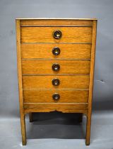 Oak Music Cabinet with five drawers with folding fronts.   Raised on straight legs it measures appro