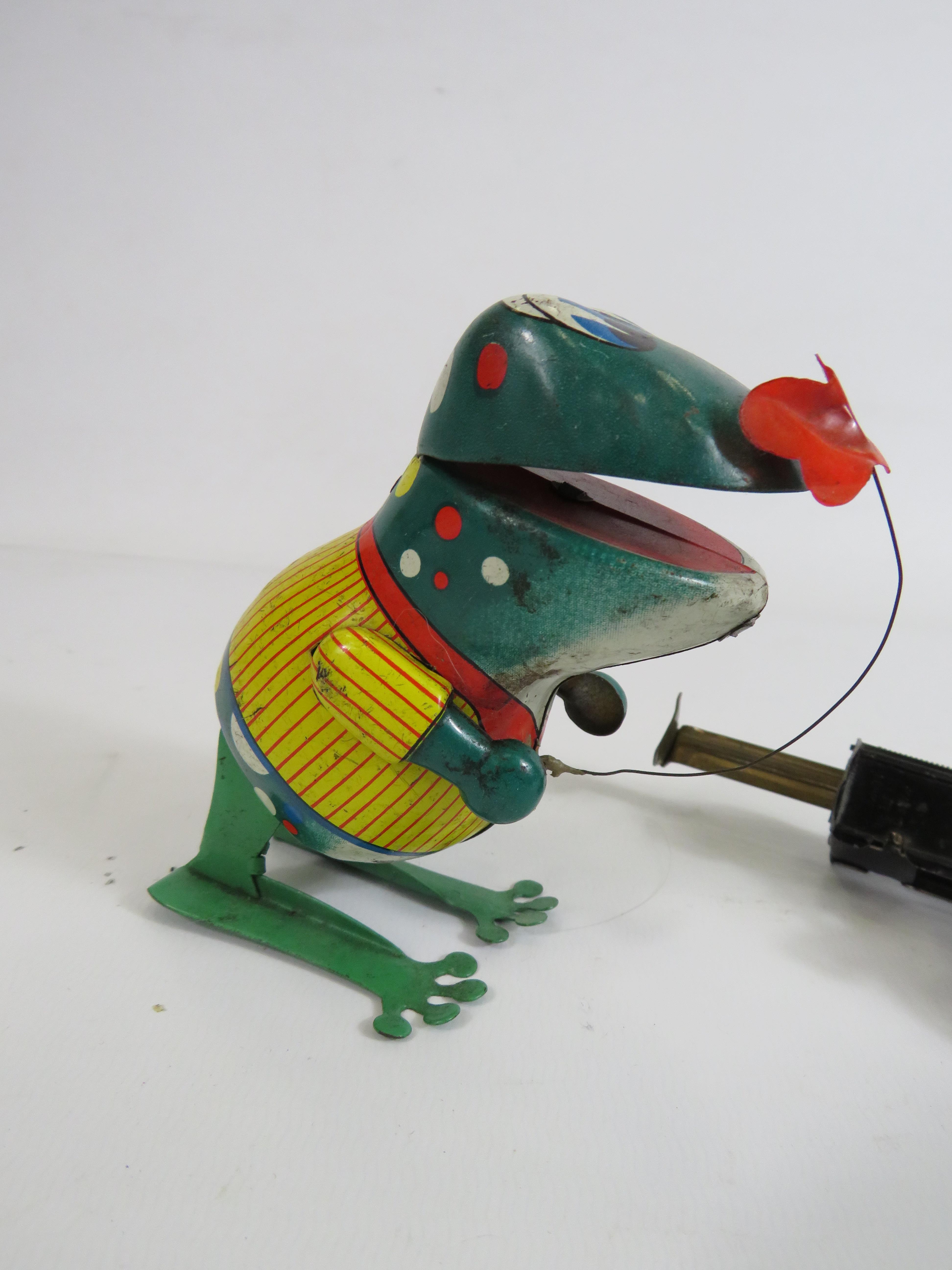 West German mechanical lever tin toy bee on a flower & a Japanese wind up tin frog. - Image 2 of 5