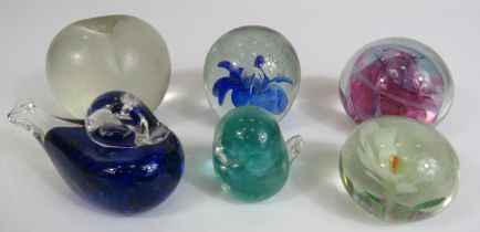 6 Art glass paperweights.