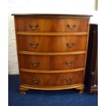 Reproduction bow fronted chest with hardwood veneer. Four drawers of good size.  Raised on bracket f