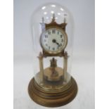 German Made Brass based Anniversary clock with enamel Dial. Sits under a Glass dome which measures