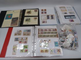 Good Mixed lot of Stamps to include WWF Album, loose stamps etc. see photos.