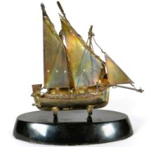 Pretty Silver Model of a Two masted Sailing boat raised on an Ebonised Plinth. Imported 925 Hallmar