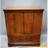 Vintage Media or Utility Cabinet on castors. Satinwood decoration. Two doors to front over shelf.  H