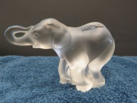 Signed Lalique glass elephant 8cm tall and 12cm long.