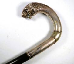 Ebonised walking cane with Continental Hallmarks to Leopard's Head Handle. Overall length approx 36