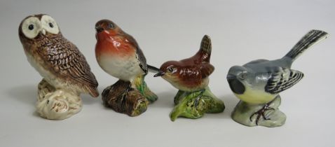 4 Beswick bird figurines, slight chip to underside of beak on wagtail.