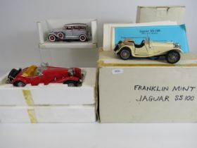 Franklin Mint diecast Mercedes and Jaguar plus one other vehicle all with boxes.