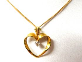 9ct Yellow Gold Open Heart Pendant set with a tiny Melee Diamond set on a 14 inch 9ct Yellow Gold Ch