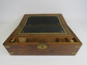 Antique wooden writing box with brass inlay, 17.5" long, 10" deep and 7" tall. Requires some Tlc.